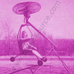 View of girl in children's tethered helicopter.